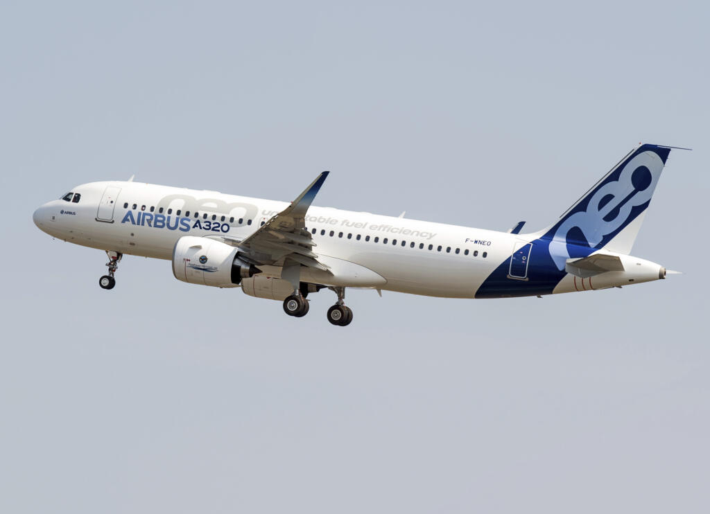 FILE - The new Airbus A320neo takes off for its first test flight at Toulouse-Blagnac airport, southwestern France, Thursday, Sept. 25, 2014. The owner of Air India announced a deal Tuesday Feb.14, 2023 to buy 250 Airbus jets, including A350 wide-body planes and A320neo single-aisle planes in a deal worth billions of dollars. Air India, owned by Tata Group, is reportedly considering a similar order for Boeing as part of expansion efforts.