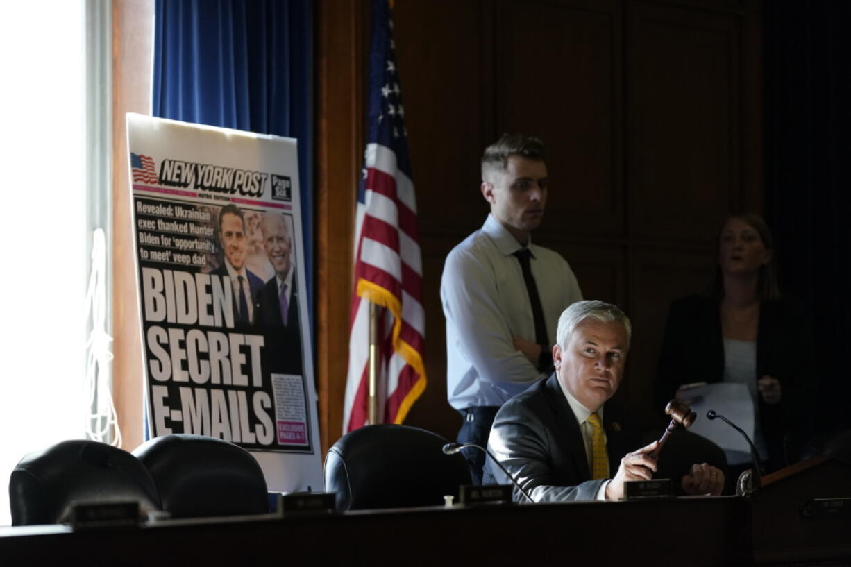 Light streams in from a window as House Oversight and Accountability Committee Chairman James Comer, R-Ky., calls a recess until full power can be restored at a House Committee on Oversight and Accountability hearing on Capitol Hill, Wednesday, Feb. 8, 2023, in Washington.