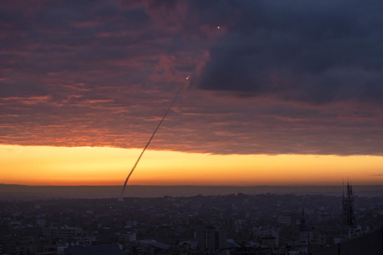 Anti-aircraft missiles are launched from the Gaza Strip after an Israeli airstrike, Thursday, Feb. 23, 2023. The Israeli military said Palestinian militants fired six rockets toward the country's south early Thursday. Israeli aircraft then struck several targets in northern and central Gaza. There were no reports of injuries in Israel or Gaza. The rocket fire followed a deadly Israeli military raid in the West Bank on Wednesday.