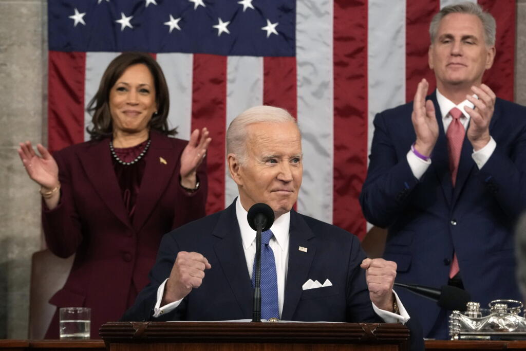 President Joe Biden delivers the State of the Union address to a joint session of Congress at the U.S. Capitol, Tuesday, Feb. 7, 2023, in Washington, as Vice President Kamala Harris and House Speaker Kevin McCarthy of Calif., applaud.