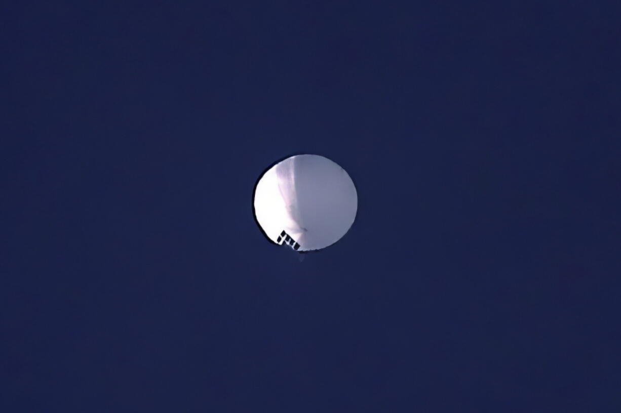 FILE - A high altitude balloon floats over Billings, Mont., Feb. 1, 2023.