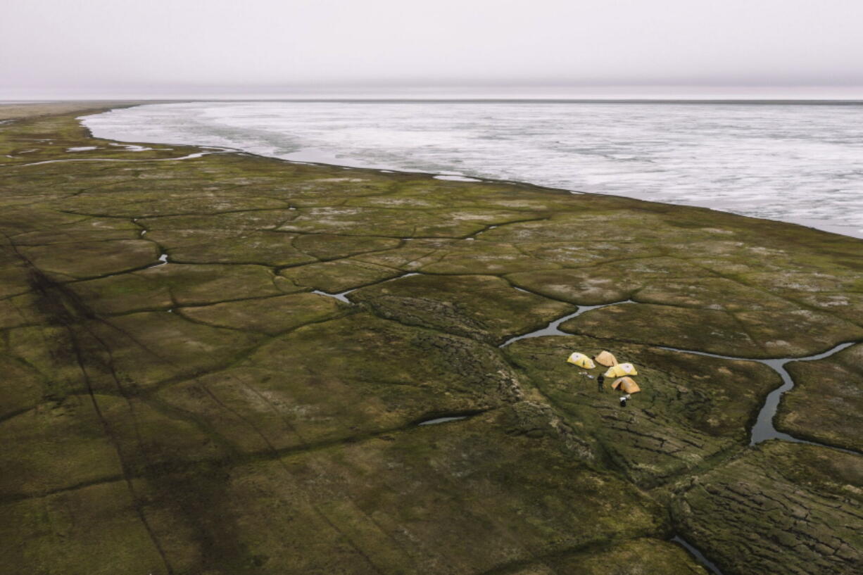 This Sunday, June 30, 2019, aerial photo released by Earthjustice shows the Alaska's North Slope in the Western Arctic on the edge of Teshekpuk Lake, Alaska. The Biden administration issued a long-awaited study on Wednesday, Feb. 1, 2023, that recommends allowing a major oil development on Alaska's North Slope, and the move -- while not final -- drew immediate anger from environmentalists who saw it as a betrayal of the president's pledges to reduce carbon emissions and promote clean energy sources.