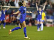 United States forward Alex Morgan (13) reacts to scoring a goal during the first half of a SheBelieves Cup soccer match against Brazil Wednesday, Feb. 22, 2023, in Frisco, Texas.