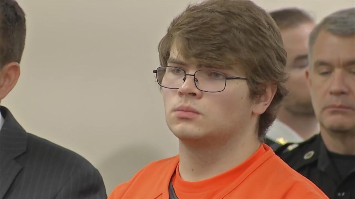 Payton Gendron listens as he is sentenced on Wednesday, Feb. 15, 2023 in Buffalo, N.Y. Gendron, a white supremacist who killed 10 Black people at a Buffalo supermarket was sentenced to life in prison after listening to relatives of his victims express the pain and rage caused by his racist attack.