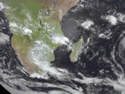 This image from Meteosat-9 satellite shows Cyclone Freddy, right, in the Indian Ocean near Madagascar, Friday, Feb. 17, 2023. Two weeks after Tropical Cyclone Cheneso devastated Madagascar, the Indian Ocean island nation and its neighbors are bracing for a more powerful Cyclone Freddy.