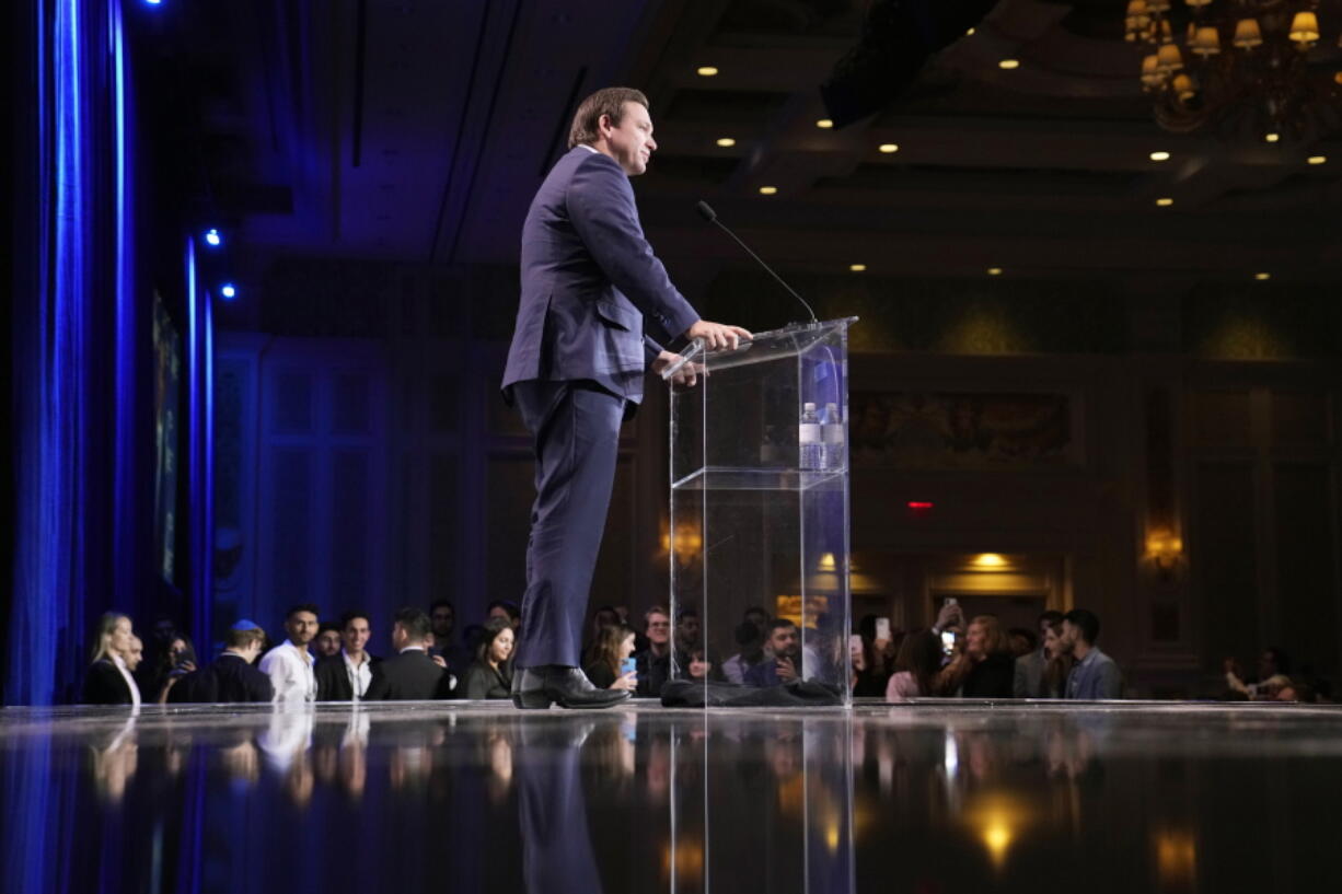 FILE - Florida Gov. Ron DeSantis speaks at an annual leadership meeting of the Republican Jewish Coalition, Nov. 19, 2022, in Las Vegas.  DeSantis has emerged as a political star early in the 2024 presidential election season even as he ignores many conventions of modern politics.
