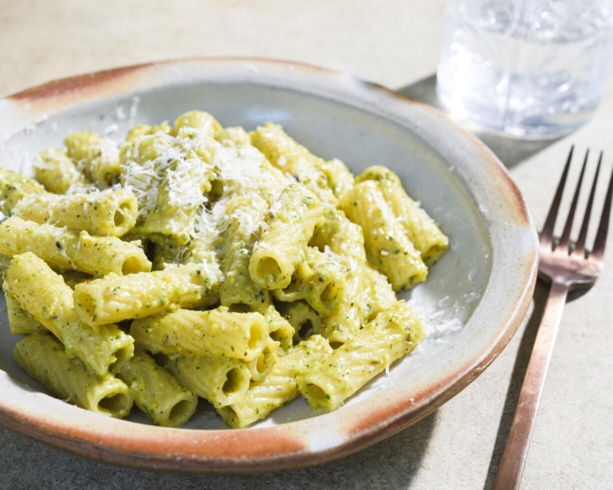 This image released by Milk Street shows a recipe for Rigatoni w/Pistachio, Ricotta and Herb Pesto.