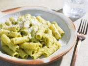 This image released by Milk Street shows a recipe for Rigatoni w/Pistachio, Ricotta and Herb Pesto.