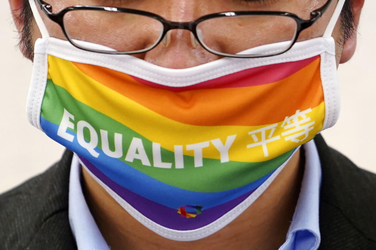 Yuichi Kamiya, Executive Director of the Japan Alliance for LGBT Legislation, speaks during a press conference Tuesday, Feb. 7, 2023, in Tokyo. Japanese LGBTQ people and rights groups hold a news conference to protest what they say are discriminatory remarks made by top aides of Prime Minister Fumio Kishida. They demand his government enact an equality law before G-7 summit.