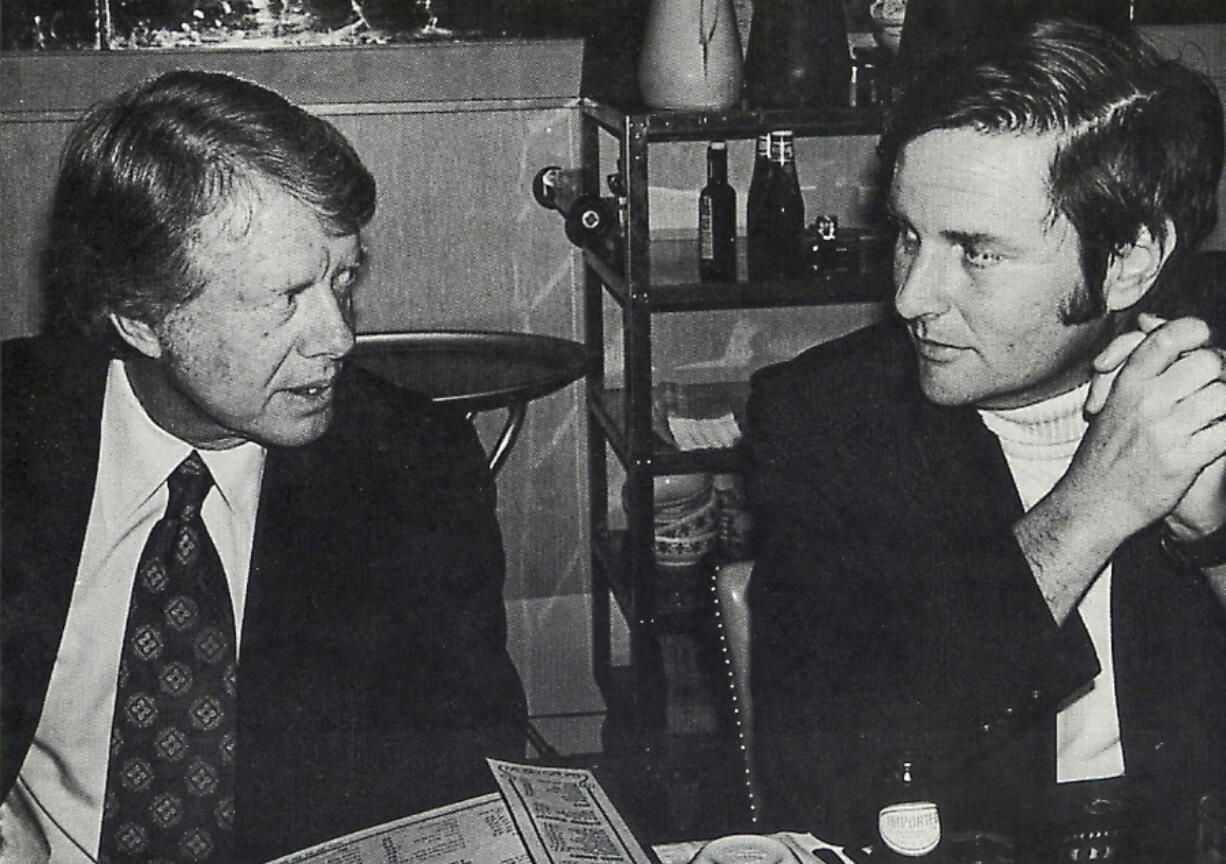 Associated Press special correspondent Walter R. Mears, right, talks with presidential candidate Jimmy Carter in Concord, N.H., before the New Hampshire primary in 1976.