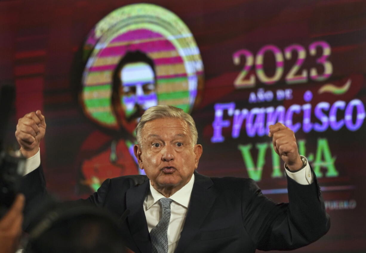 Mexican President Andres Manuel Lopez Obrador gives his regularly scheduled morning press conference, decorated with an image of Francisco "Pancho" Villa, a general in the Mexican Revolution, at the National Palace in Mexico City, Tuesday, Feb. 28, 2023.