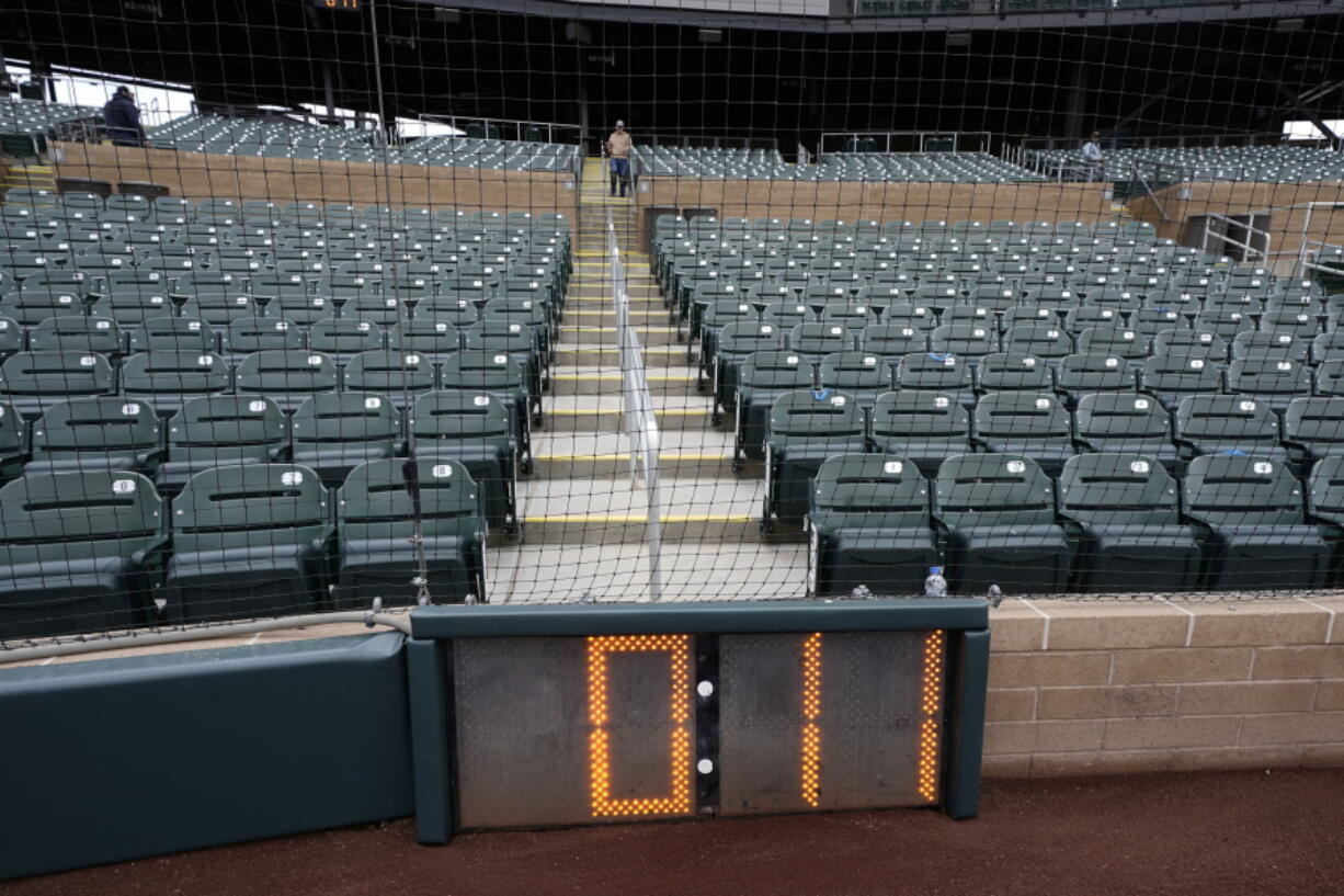 The new pitch clock is seen at Salt River Field Tuesday, Feb. 14, 2023, in Scottsdale, Ariz. Opening day will feature three of the biggest changes in baseball since 1969: Two infielders will be required to be on either side of second base, base size will increase to 18-inch squares from 15 and a pitch clock will be used.