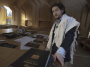 Rabbi Joshua Franklin stands Feb. 10 inside the sanctuary at the Jewish Center of the Hamptons in East Hampton, N.Y.