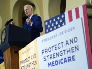 FILE - President Joe Biden speaks about his administration's plans to protect Social Security and Medicare and lower healthcare costs, Feb. 9, 2023, at the University of Tampa in Tampa, Fla. It seems like no one wants to cut Social Security or Medicare benefits, including Biden, who is already telling voters that his upcoming federal budget proposal will "defend and strengthen" the programs.