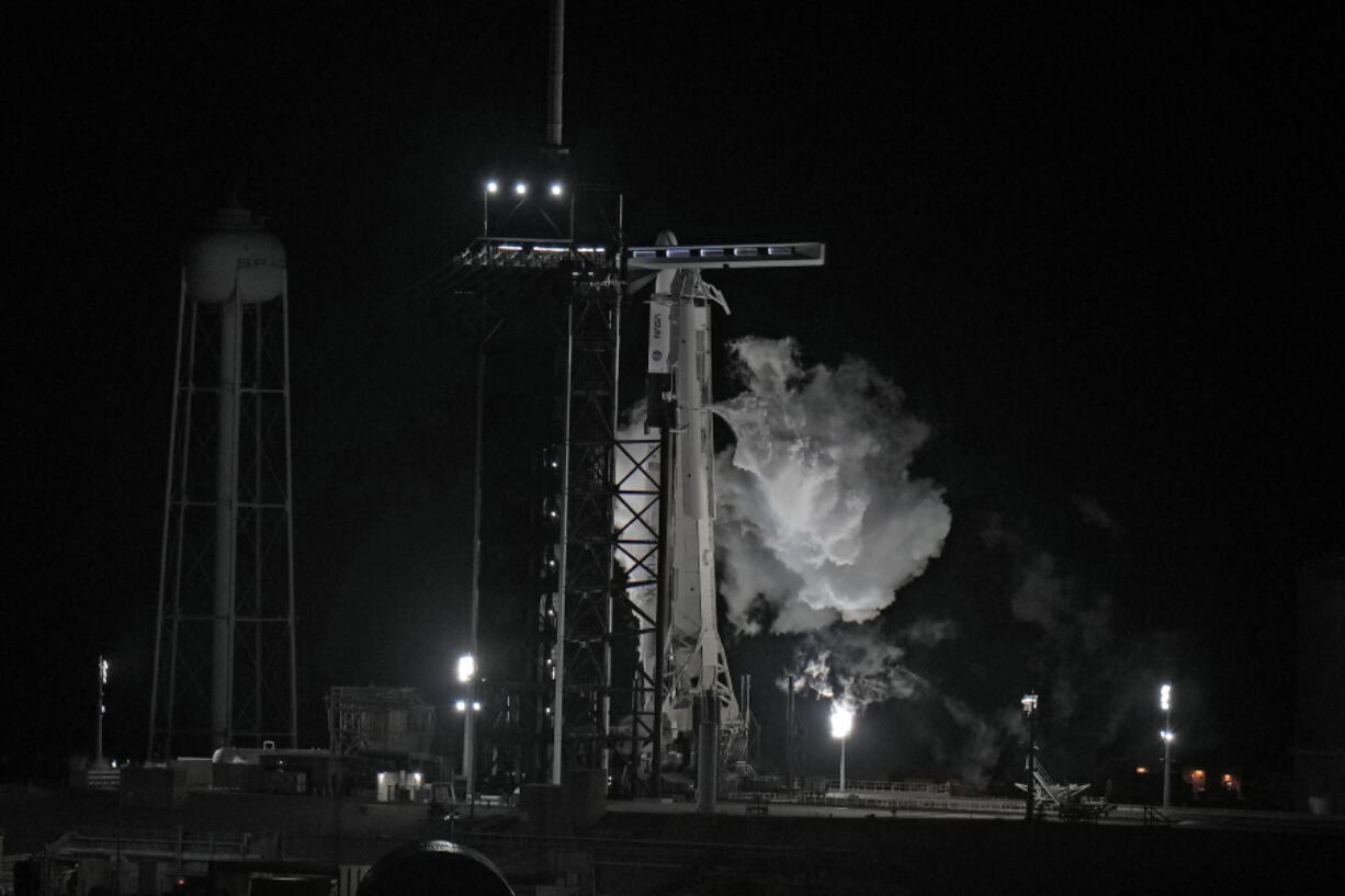 Fuel vents from a SpaceX Falcon 9 rocket as she sits on Launch Complex 39-A Monday, Feb. 27, 2023, after the launch was scrubbed at the Kennedy Space Center in Cape Canaveral, Fla.