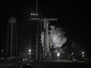 Fuel vents from a SpaceX Falcon 9 rocket as she sits on Launch Complex 39-A Monday, Feb. 27, 2023, after the launch was scrubbed at the Kennedy Space Center in Cape Canaveral, Fla.