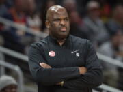 Atlanta Hawks head coach Nate McMillan watches the game from the sideline during the first half of an NBA basketball game against the San Antonio Spurs, Saturday, Feb. 11, 2023, in Atlanta.