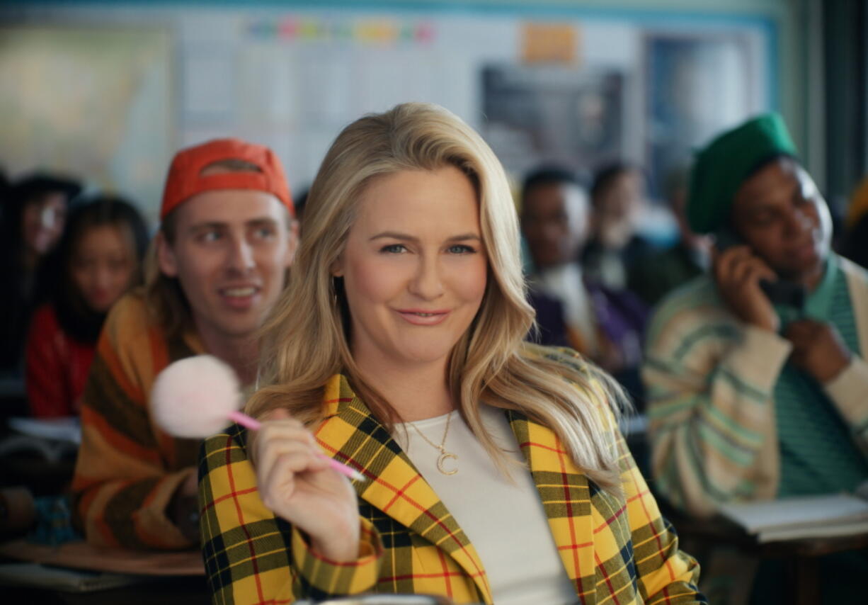 This photo provided by Rakuten Rewards shows Alicia Silverstone in a scene from Rakuten Rewards 2023 Super Bowl NFL football spot.  Big name advertisers are paying as much as $7 million for a 30-second spot during the big game on Sunday, Feb. 12, 2023. In order to get as much as a return on investment for those million, most advertisers release their ads in the days ahead of the big game to get the most publicity for their spots.