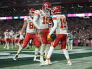 Kansas City Chiefs wide receiver Kadarius Toney (19) celebrates his touchdown with quarterback Patrick Mahomes (15) during the second half of the NFL Super Bowl 57 football game against the Philadelphia Eagles, Sunday, Feb. 12, 2023, in Glendale, Ariz.