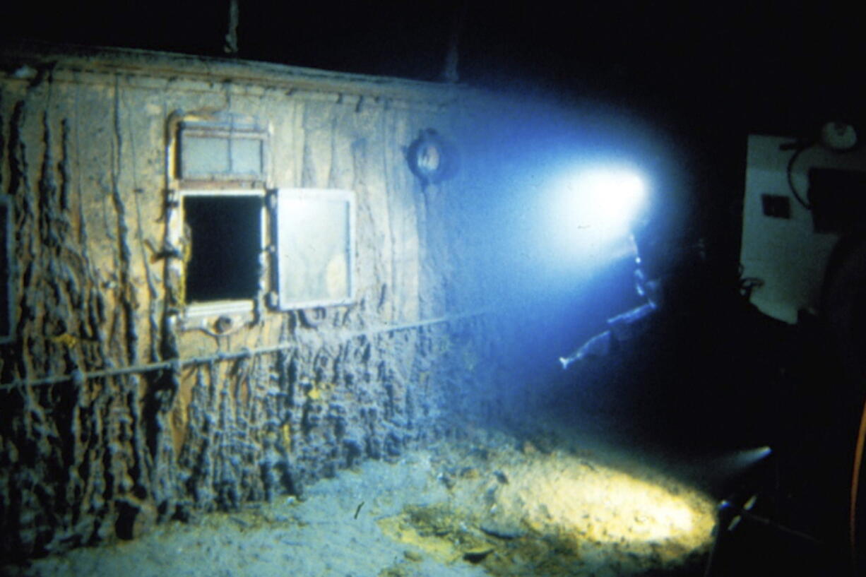 This image provided by the Woods Hole Oceanographic Institution shows the deck of Titanic 12,500 feet (3.8 kilometers) below the surface of the ocean, 400 miles (640 kilometers) off the coast of Newfoundland, Canada in 1986. Rare and in some cases never before publicly seen video of the dive is being released on Wednesday, Feb. 15, 2023, by the Woods Hole Oceanographic Institution.