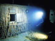 This image provided by the Woods Hole Oceanographic Institution shows the deck of Titanic 12,500 feet (3.8 kilometers) below the surface of the ocean, 400 miles (640 kilometers) off the coast of Newfoundland, Canada in 1986. Rare and in some cases never before publicly seen video of the dive is being released on Wednesday, Feb. 15, 2023, by the Woods Hole Oceanographic Institution.