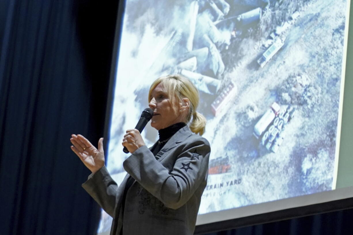 Activist Erin Brockovich speaks during a town hall meeting at East Palestine High School concerning the Feb. 3 Norfolk Southern freight train derailment in East Palestine, Ohio, Friday, Feb. 24, 2023.