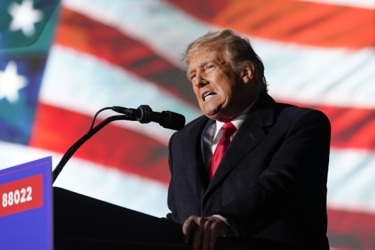 FILE - Former President Donald Trump speaks at a campaign rally in support of the campaign of Ohio Senate candidate JD Vance at Wright Bros. Aero Inc. at Dayton International Airport, Nov. 7, 2022, in Vandalia, Ohio. Trump is set to visit East Palestine, Ohio, to tour the site of a toxic train derailment amid growing frustration from local residents and leaders about the federal government's response to their safety concerns. Wednesday's trip comes as Trump and other Republicans have ramped up criticism of the Biden administration's handling of the Feb. 3 derailment, which led to evacuations and fears of contamination of the village's air and drinking water.