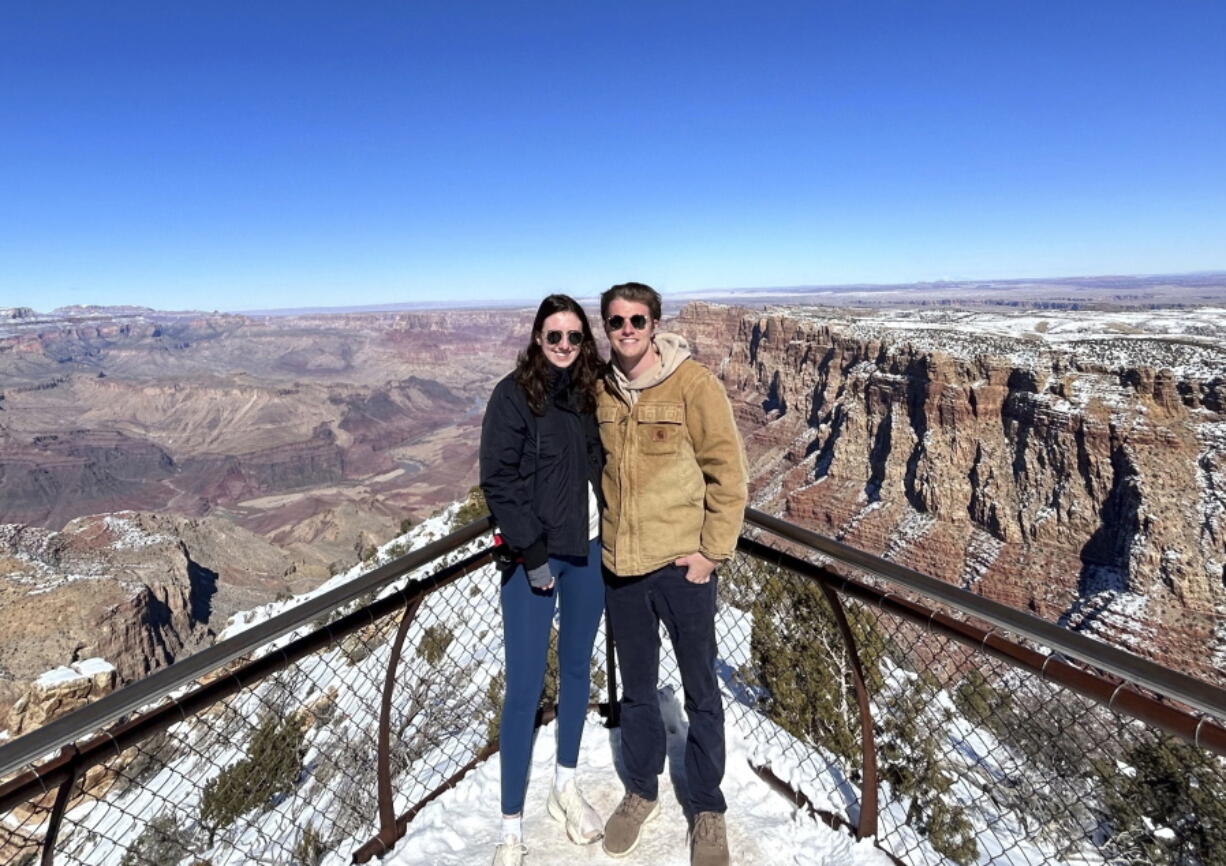 This Jan. 28, 2023, photo shows Liv Loughlin and her boyfriend, Hollister Van Nice, at the Grand Canyon. The two met on Bumble. Whether looking for love or a casual encounter, 3 in 10 U.S. adults say they have used a dating site or app -- with mixed experiences, according to a Pew Research Center study.