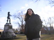 In this Tuesday, Jan. 24, 2023 photo, Beth Caruso, author and co-founder of the CT Witch Trial Exoneration Project, which was created to clear the names of the accused, stands on the Palisado Green in Windsor, Conn., where in 1651, an accident during a local militiamen training exercise led to the accusation of witchcraft and hanging of Lydia Gilbert. Now, more than 375 years later, amateur historians, researchers and descendants of the accused witches and their accusers, from across the U.S., are urging Connecticut officials to officially acknowledge this dark period of the state's colonial history and posthumously exonerate those wrongfully accused and punished.