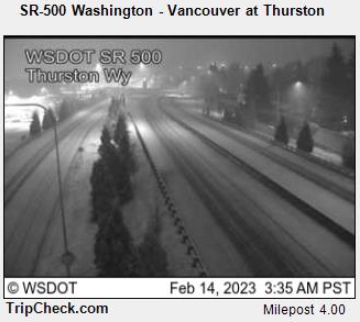 Valentine's Day snow briefly covers Highway 500 near Northeast Thurston Way in this WSDOT traffic cam screen grab downloaded by the National Weather Service in Portland.