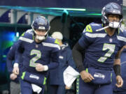 Seattle Seahawks quarterbacks Geno Smith (7) and Drew Lock (2) will be together again in 2023 as Lock has a new one-year deal to stay in Seattle.