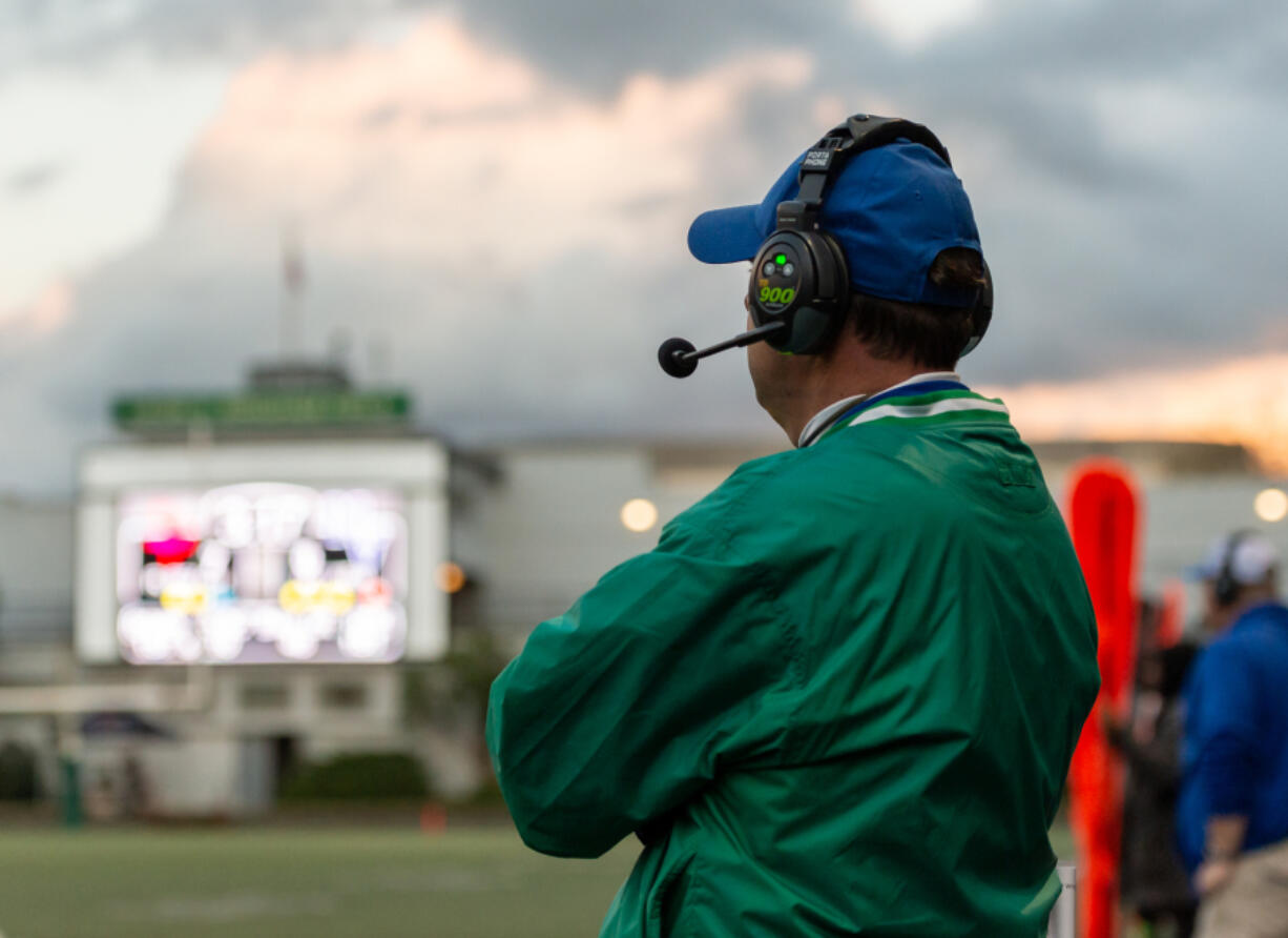 Coach Adam Mathieson looks on as his Mountain View Thunder play in a district playoff game on Saturday, Nov. 5, at Seattle Memorial Stadium.