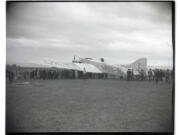 The Soviet ANT-4 airplane was examined by a crowd at Pearson Field in Vancouver on Oct. 18 or 19, 1929. The transport bomber, "Land of the Soviets," developed engine trouble shortly after reaching Portland during a trans-Siberian flight from Moscow to New York.