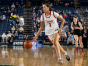 Camas junior forward Reagan Jamison dribbles on a fast break during the WIAA Class 4A State Girls Basketball Championship on Saturday, March 4, 2023, at the Tacoma Dome.