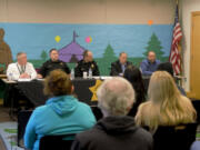 Clark County Sheriff's Office administrators, from left, Administrative Deputy Mike McCabe, Chief Criminal Deputy Brian Kessel, Sheriff John Horch, Undersheriff Jim Hansen and Chief Civil Deputy Duncan Hoss share updates about the agency with community members at a forum Wednesday evening at the Three Creeks Community Library in Salmon Creek. Horch hopes to host similar forums every few months in different parts of the county.