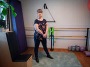 Jenny Bevard stands in her wellness room that she created after being diagnosed with long COVID as a space to focus on both her mental and physical health.