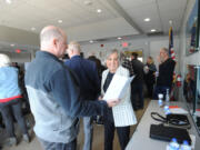 Washington Sen. Lynda Wilson, R-Vancouver, speaks with Vancouver resident Bob Runnells following a 17th District town hall meeting at the Port of Camas-Washougal on March 18.