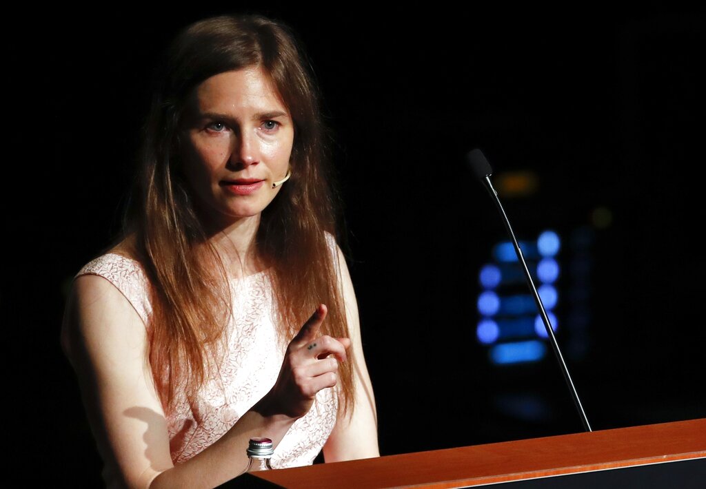 Amanda Knox speaks at a Criminal Justice Festival at the University of Modena, Italy, Saturday, June 15, 2019. Knox, a former American exchange student who became the focus of a sensational murder case, arrived in Italy Thursday for the first time since an appeals court acquitted her in 2011 in the slaying of her British roommate.