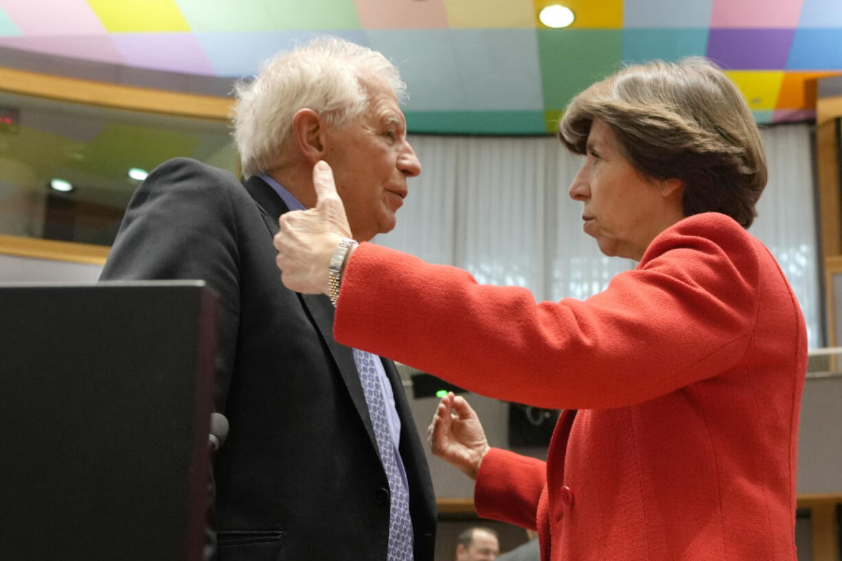 European Union foreign policy chief Josep Borrell, left, speaks with France's Foreign Minister Catherine Colonna during a meeting of EU foreign ministers at the European Council building in Brussels on Monday, March 20, 2023. European Union foreign ministers on Monday will discuss the situation in Ukraine and Tunisia.