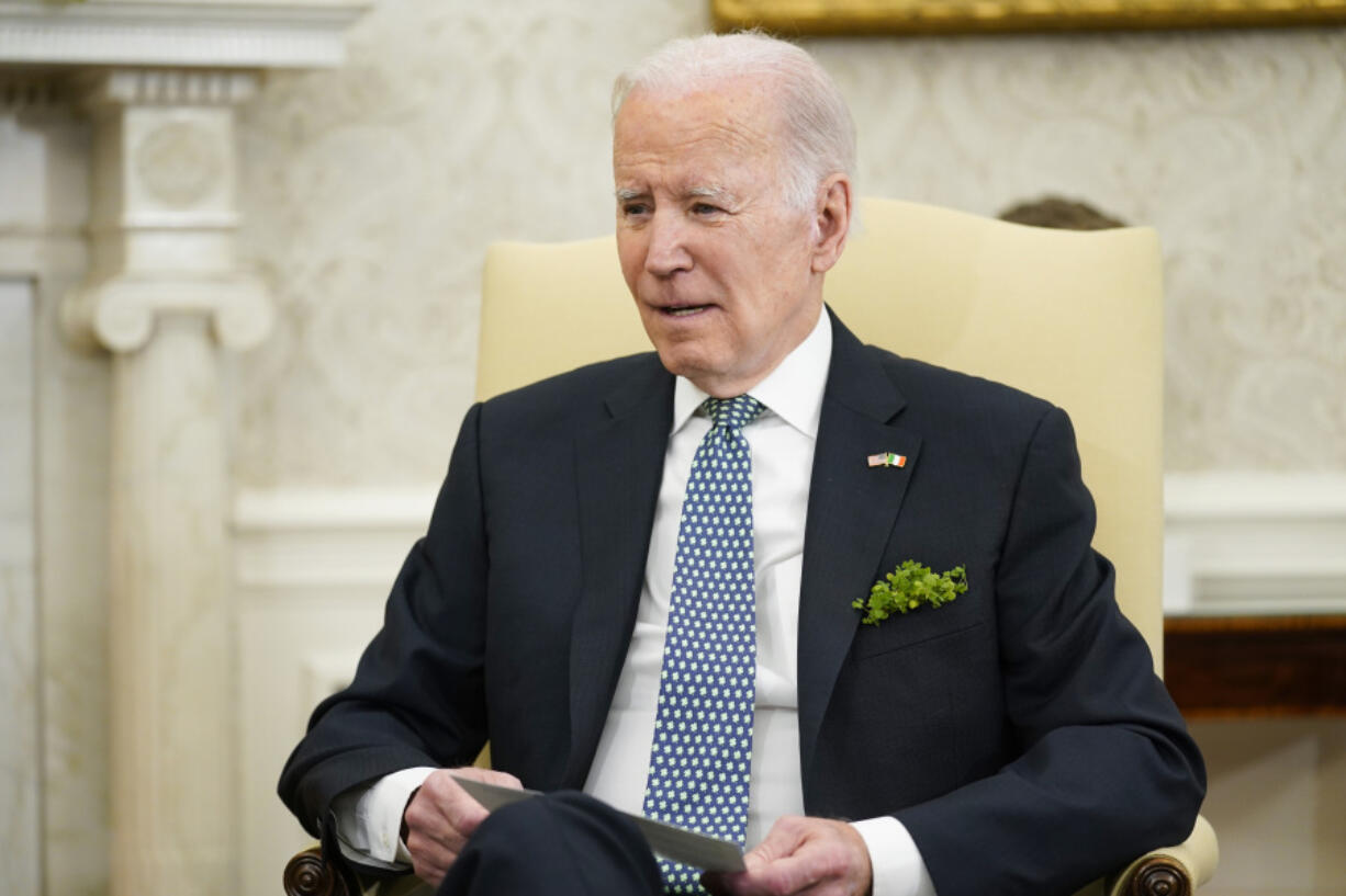 President Joe Biden speaks as he meets with Ireland's Taoiseach Leo Varadkar in the Oval Office of the White House, Friday, March 17, 2023, in Washington. Biden on Friday called on Congress to allow regulators to impose tougher penalties on the executives of failed banks, including clawing back compensation and making it easier to bar them from working in the industry.