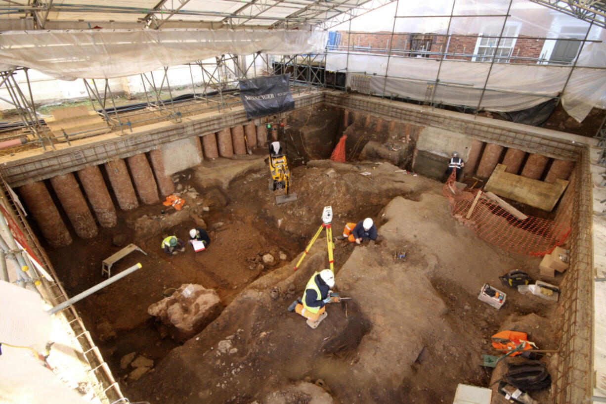 This Feb. 2023 photo, issued on Tuesday March 7, 2023 by the University of Leicester, shows an archaeological dig in the grounds of Leicester Cathedral, which began in October 2021. Experts from the University of Leicester said Tuesday that they have uncovered what they believe to be a Roman shrine beneath a former graveyard in the grounds of a cathedral in central England.