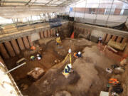 This Feb. 2023 photo, issued on Tuesday March 7, 2023 by the University of Leicester, shows an archaeological dig in the grounds of Leicester Cathedral, which began in October 2021. Experts from the University of Leicester said Tuesday that they have uncovered what they believe to be a Roman shrine beneath a former graveyard in the grounds of a cathedral in central England.