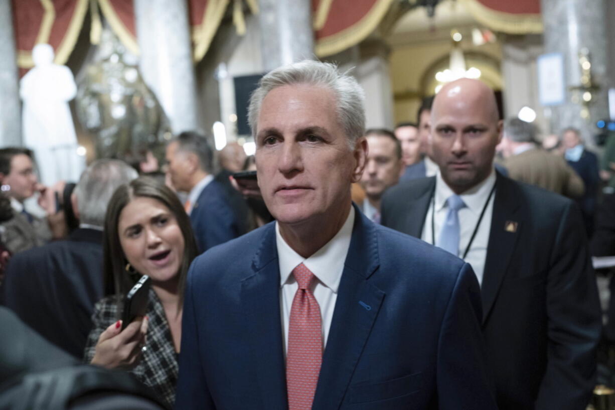 FILE - Speaker of the House Kevin McCarthy, R-Calif., leaves the House Chamber after President Joe Biden's State of the Union address to a joint session of Congress at the Capitol, Feb. 7, 2023, in Washington. Thousands of hours surveillance footage from the Jan. 6, 2021 Capitol attack are being made available to Fox News' Tucker Carlson. It's a stunning level of access granted by McCarthy that is raising new questions about the House Republican leader's commitment to transparency, oversight and safety at the Capitol.