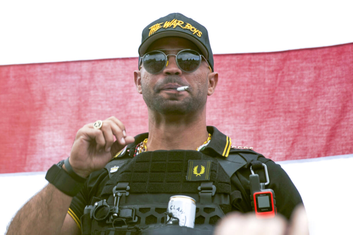 FILE - Proud Boys leader Henry "Enrique" Tarrio wears a hat that says The War Boys during a rally in Portland, Ore., Sept. 26, 2020. Federal prosecutors have rested their seditious conspiracy case against former Proud Boys leader Enrique Tarrio and four lieutenants charged with plotting to stop the peaceful transfer of presidential power from Donald Trump to Joe Biden after the 2020 election. Jurors will hear testimony by defense witnesses before they begin deliberating.