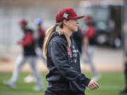 FILE - In a photo provided by the Arizona Diamondbacks, Ronnie Gajownik watches the baseball team's minor league minicamp at Salt River Fields in February 2022 in Scottsdale, Ariz. As Gajownik prepares for her first managing job in the minor leagues, took on a temporary role Saturday, March 4 -- bench coach for the Arizona Diamondbacks. D-backs manager Torey Lovullo confirmed Gajownik's spot before the spring training game against San Diego.