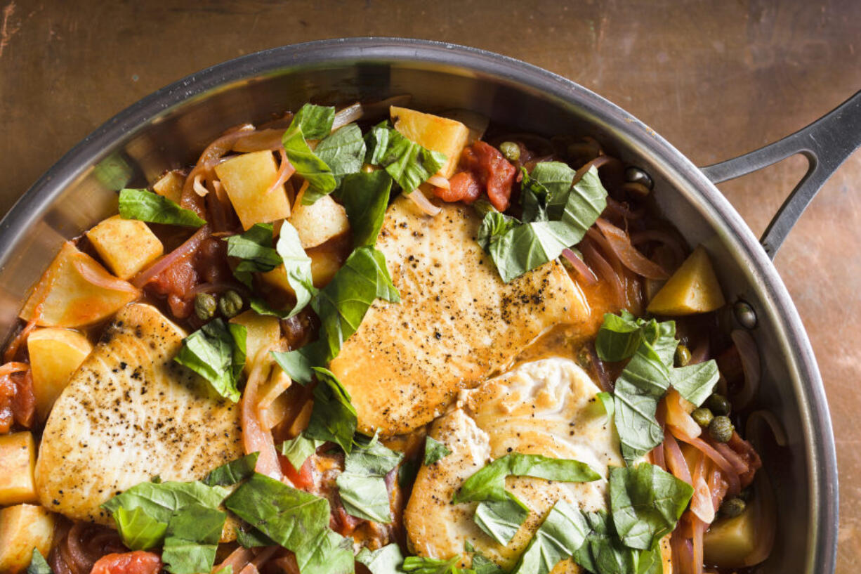 Swordfish With Potatoes, Tomatoes and Capers.