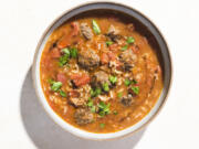 Syrian-style Meatball Soup With Rice and Tomatoes.