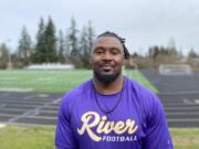 Dewayne Patterson, shown here Monday outside John O'Rourke Field, is Columbia River's new football coach.