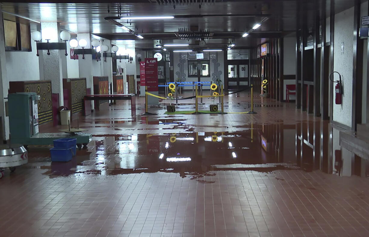 Damage is shown at the Quelimane Airport, Mozambique Sunday, March 12, 2023. Record-breaking Cyclone Freddy made its second landfall in Mozambique Saturday night, pounding the southern African nation with heavy rains and disrupting transport and telecommunications services.