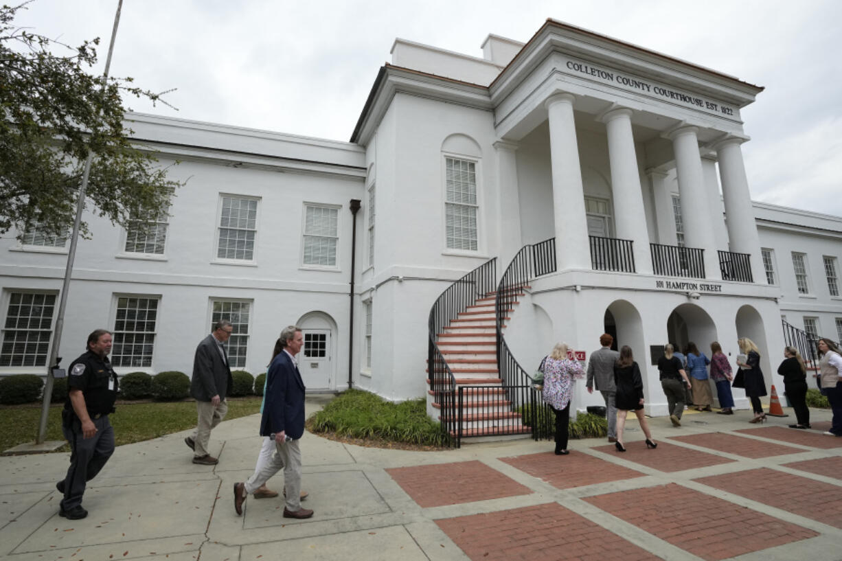 Members of the media and general public gathered outside the Colleton County Courthouse Thursday, March 2, 2023, in Walterboro, S.C. As the double murder trial of Alex Murdaugh wraps, the heaps of public attention poured on the case's many twists and turns. The 54-year-old attorney is standing trial on two counts of murder in the shootings of his wife and son at their Colleton County home and hunting lodge on June 7, 2021.